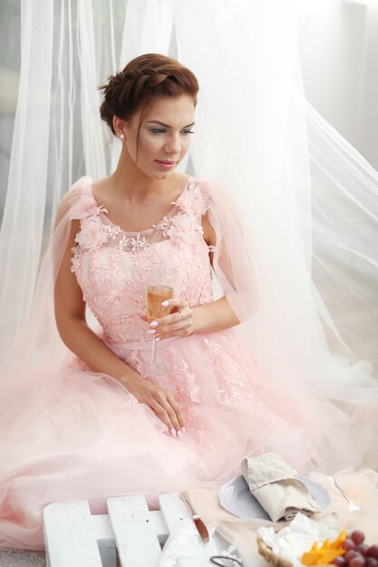 Bride in pink dress