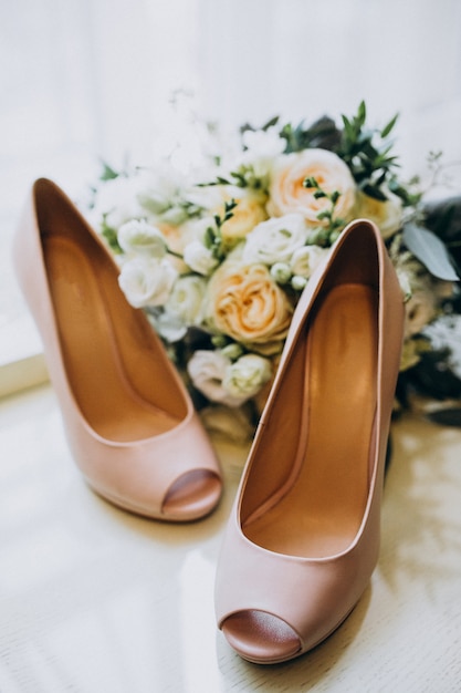 Free photo bride's wedding shoes