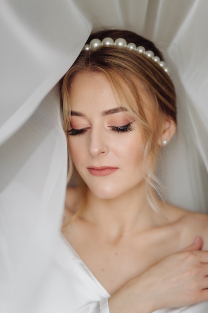 bride surrounded by the veil