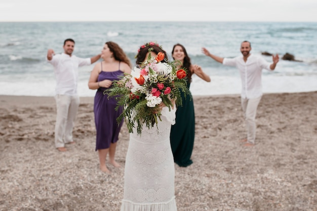 Free photo bride wanting to throw her flower bouquet