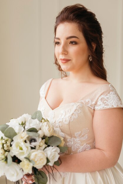 Bride with bouquet of flowers