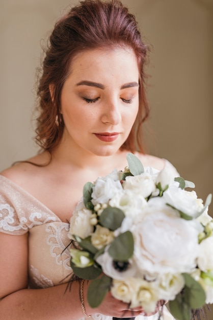 Bride with bouquet of flowers