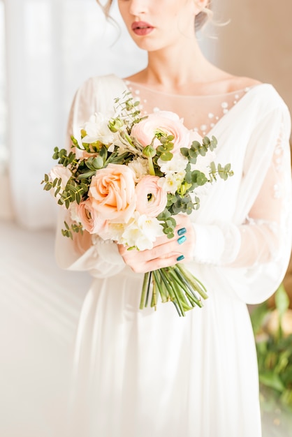 Bride with bouquet of flowers