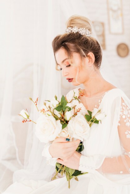 Bride with bouquet of flowers