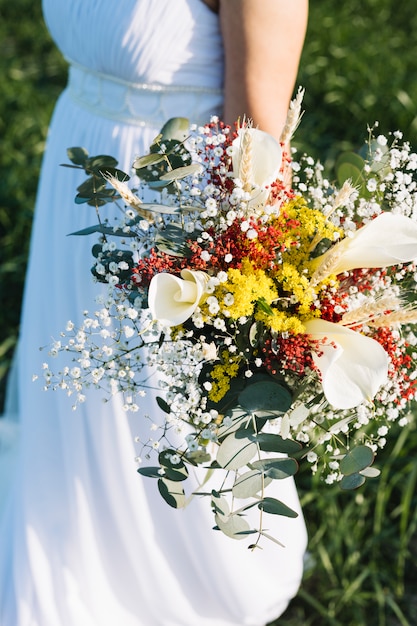 Bride with bouquet of flowers