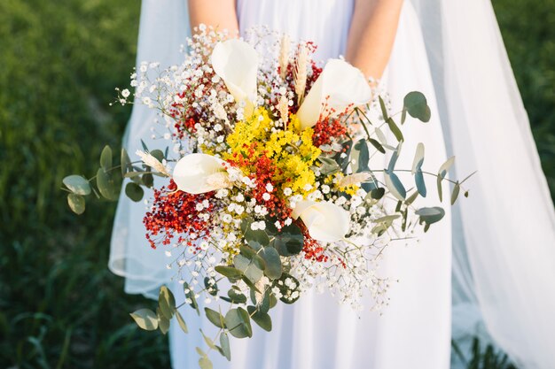 Bride with bouquet of flowers