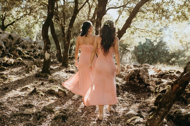 Free Photo bridesmaids in pretty dresses outdoors