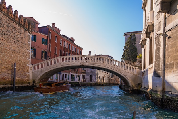 Bridge over a canal surrounded by buildings