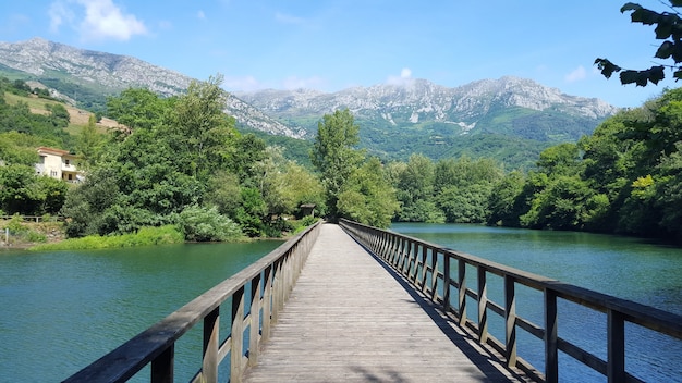 Free photo bridge over the lake in asturias, spain