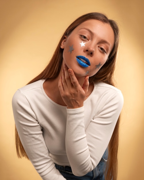 Free photo bright blue lips portrait with copy space