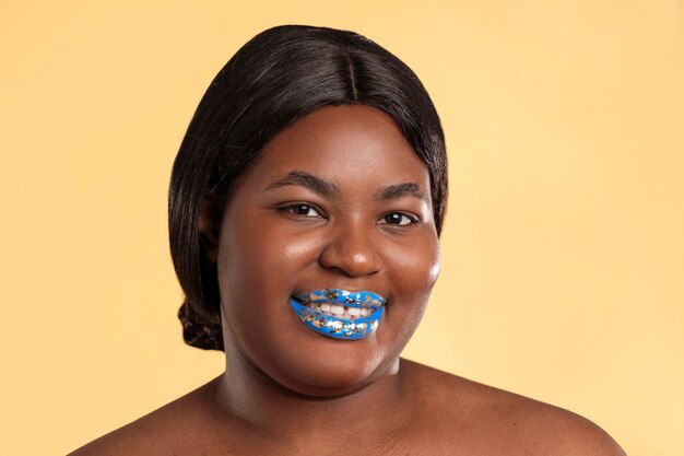 Bright blue lips portrait with copy space