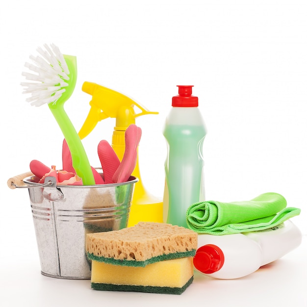 Free photo bright colorful cleaning set on a wooden table