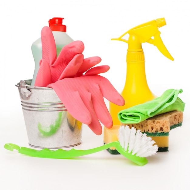 Bright colorful cleaning set on a wooden table