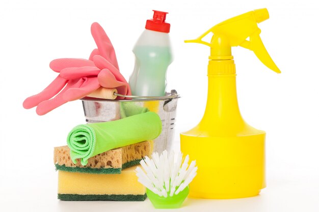 Bright colorful cleaning set on a wooden table