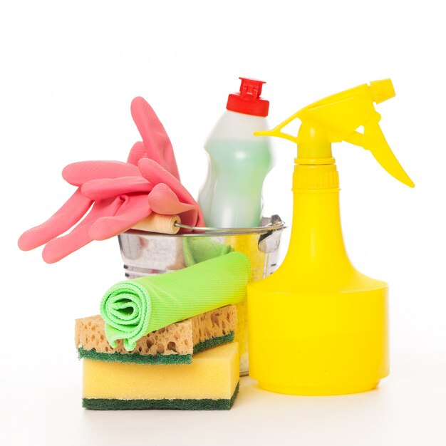 Bright colorful cleaning set on a wooden table