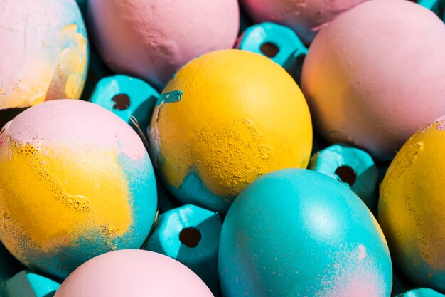 Bright Easter eggs in rack 