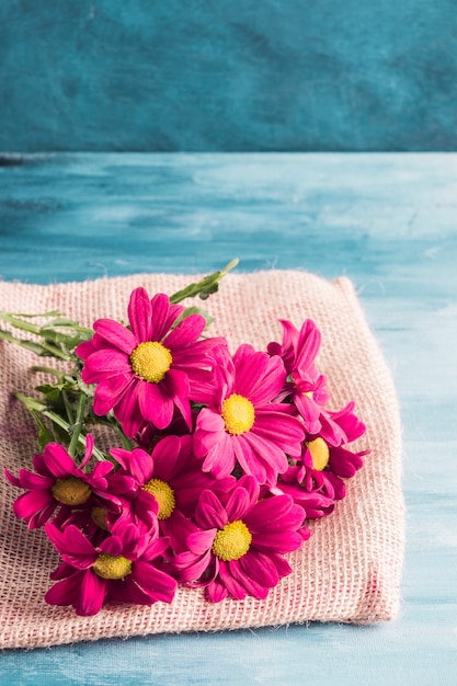 Free photo bright flowers bouquet on canvas