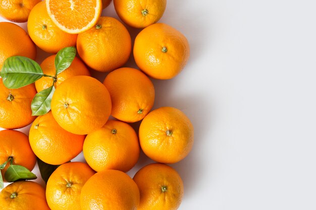 Bright juicy ripe orange fruits with leaves