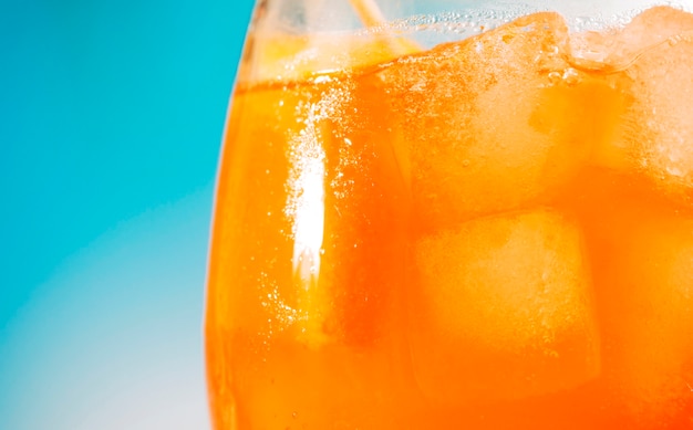 Free photo bright orange fresh drink in glass