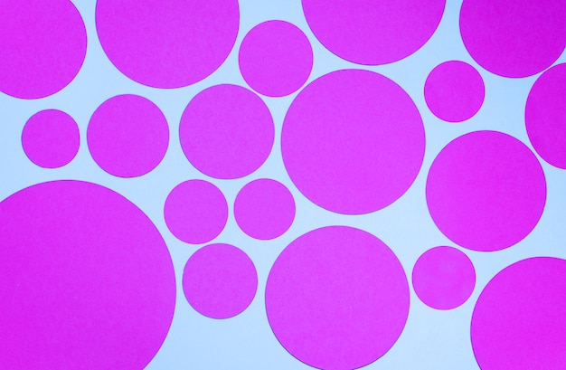 Free Photo bright pattern of pink circles on blue background