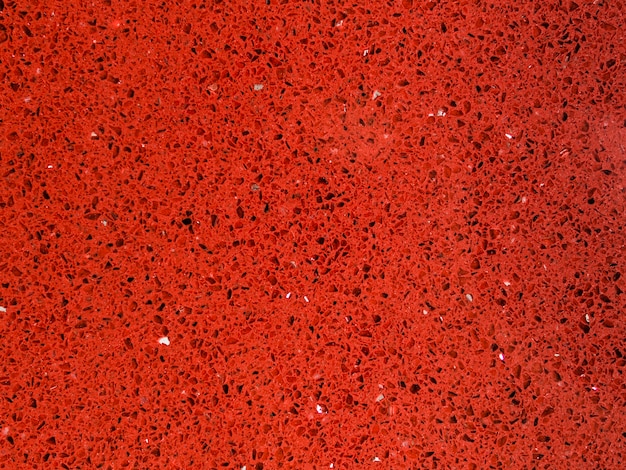 Free photo bright red textured of tile background