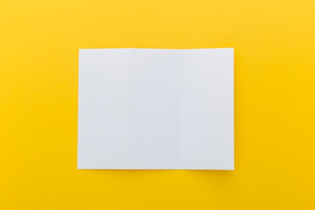 Brochure on yellow background