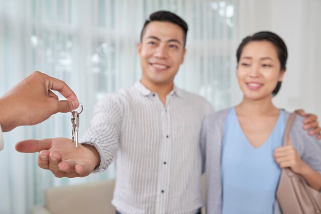 Broker giving house keys