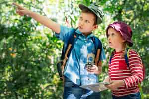 Free photo brother showing his sister where to go