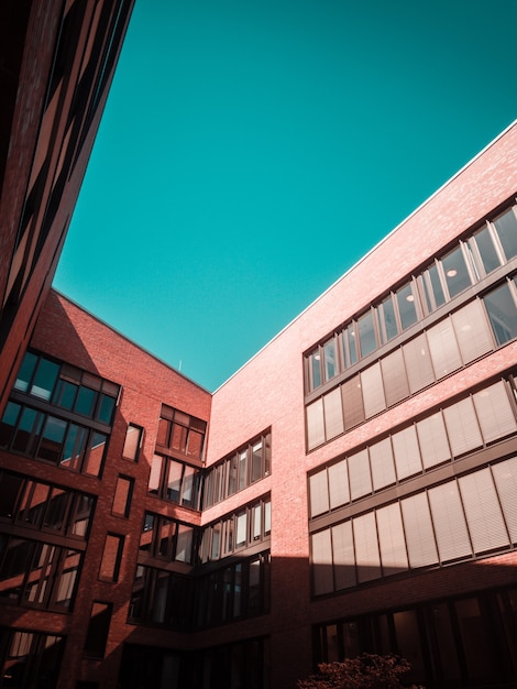 Brown concrete building and clear blue sky