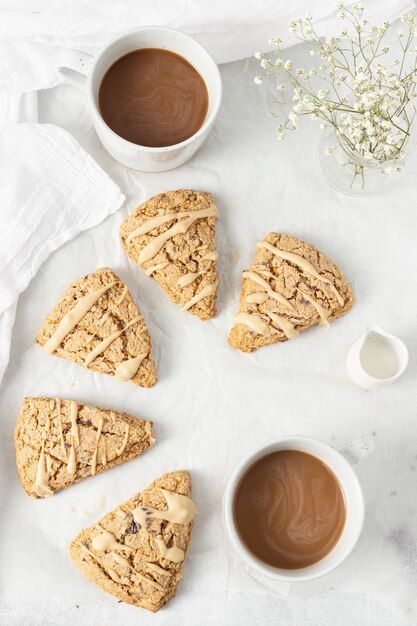 Brown cookies on white ceramic plate