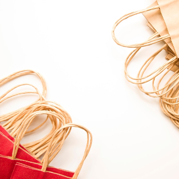 Brown and red paper shopping packets