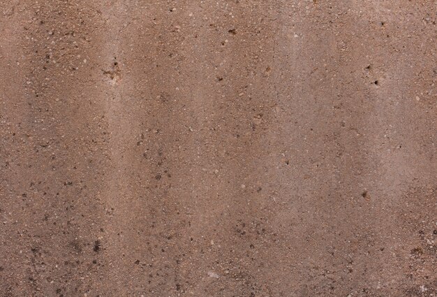 Brown stained asphalt surface