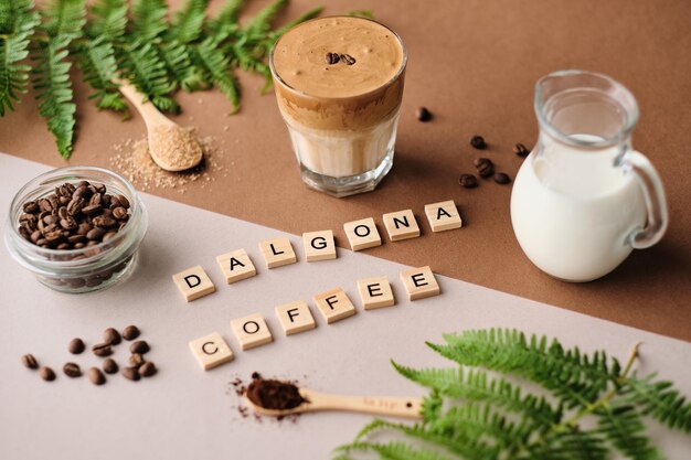 Brown sugar coffee beans and green plant