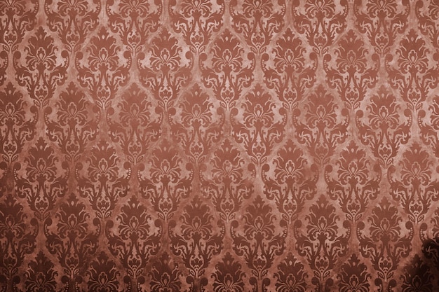 Free photo brown vintage pattern on old wall. rich vintage retro pattern interior