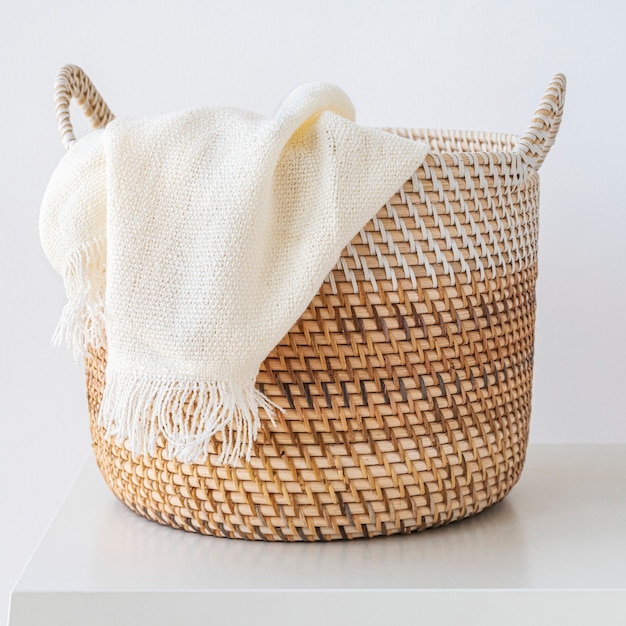 Brown wicker laundry basket design element