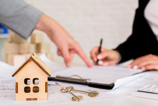 Brown wooden cottage with keys