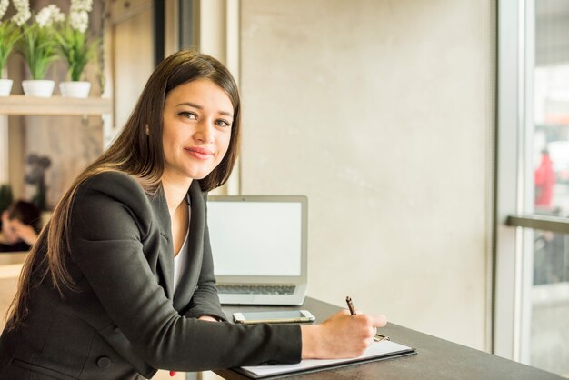 Brunette businesswoman posing