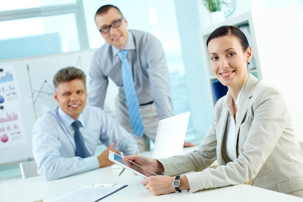 Free photo brunette executive at a meeting