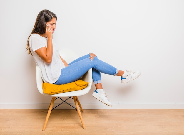 Free photo brunette girl talking on phone