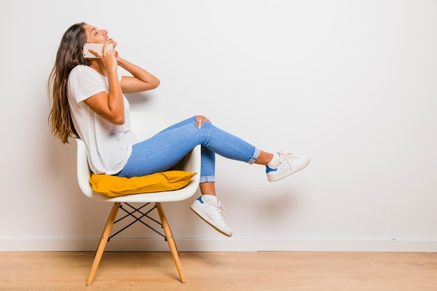 Brunette girl talking on phone