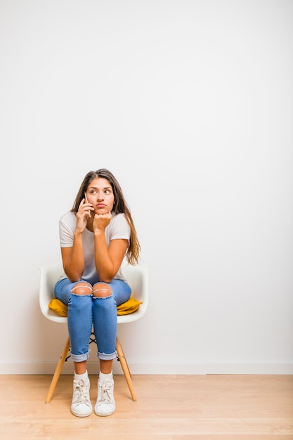 Free photo brunette girl talking on phone