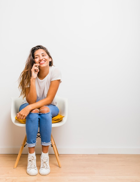 Free photo brunette girl talking on phone