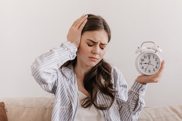 Brunette woman has headache