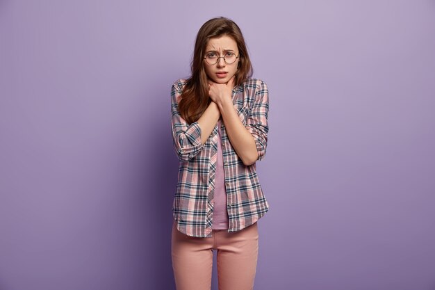 Brunette woman wearing colorful shirt