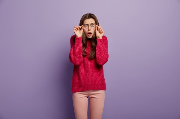 Brunette woman wearing knitted sweater