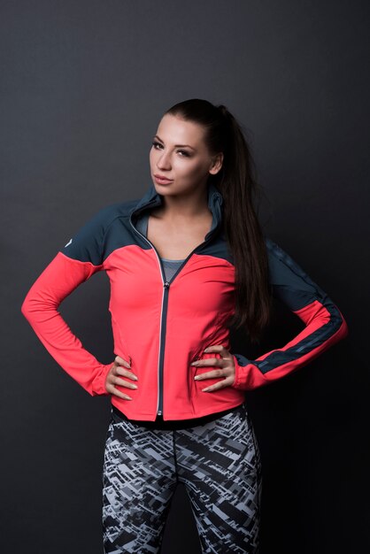 Brunette woman wearing sport clothes