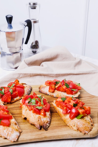 Bruschetta on a chopping board