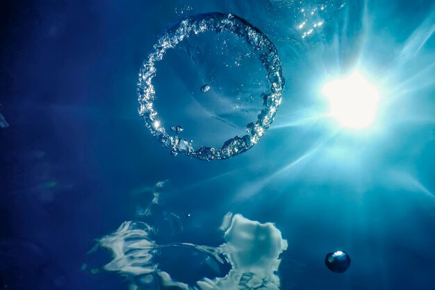 Bubble Ring Underwater ascends towards the Sun.