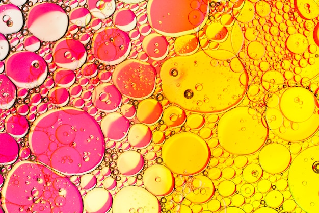 Free Photo bubbles on an abstract oil design