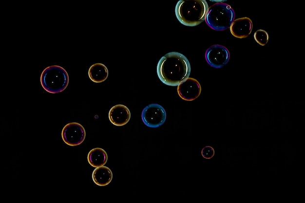 Free Photo bubbles on black background